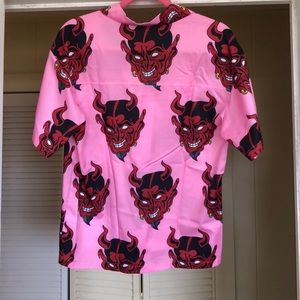 pink and red devil shirt